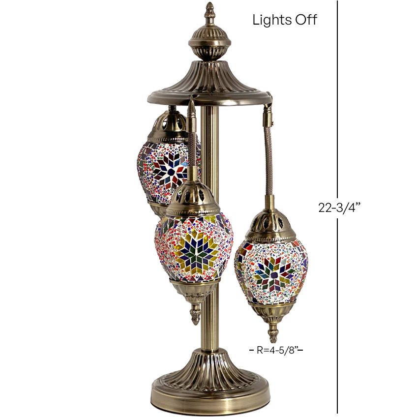 a table lamp with three colorful lights on it