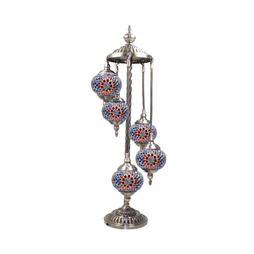 a metal pole with four glass balls hanging from it