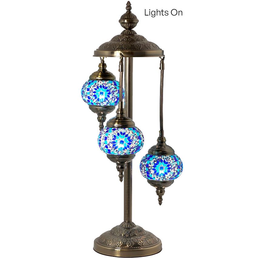 three blue and white lights on a stand