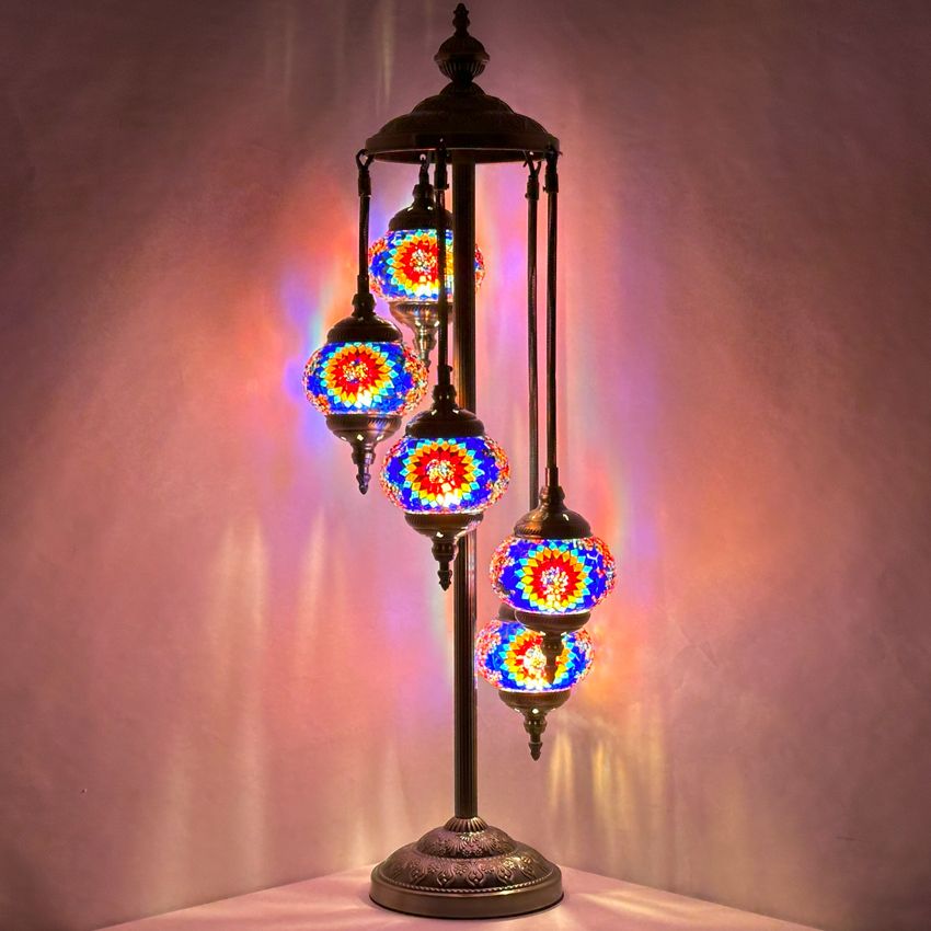 a multicolored lamp with three lights on it