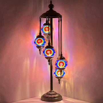 a multicolored lamp with three lights on it