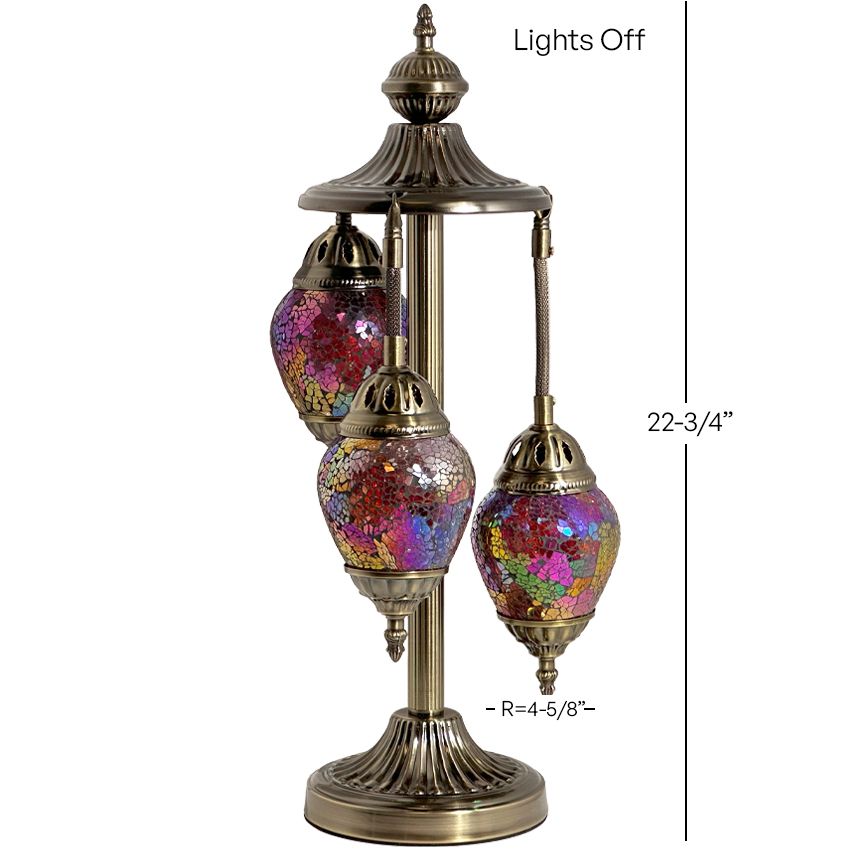 a table lamp with three lights on top of it