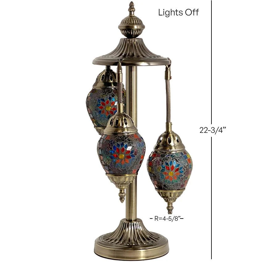 a table lamp with three lights on it