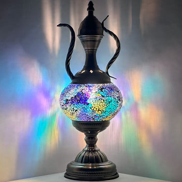 a black vase with a colorful design on it