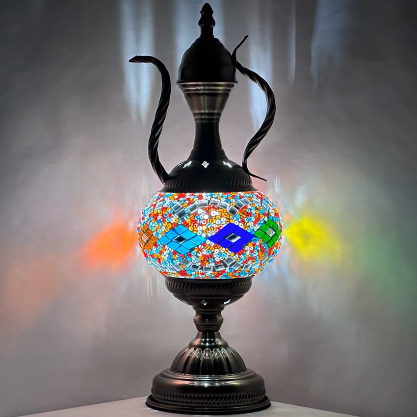 a black vase with a colorful design on it