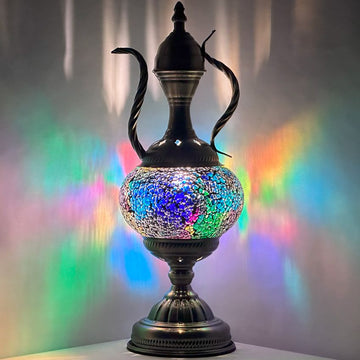 a black vase with a colorful design on it