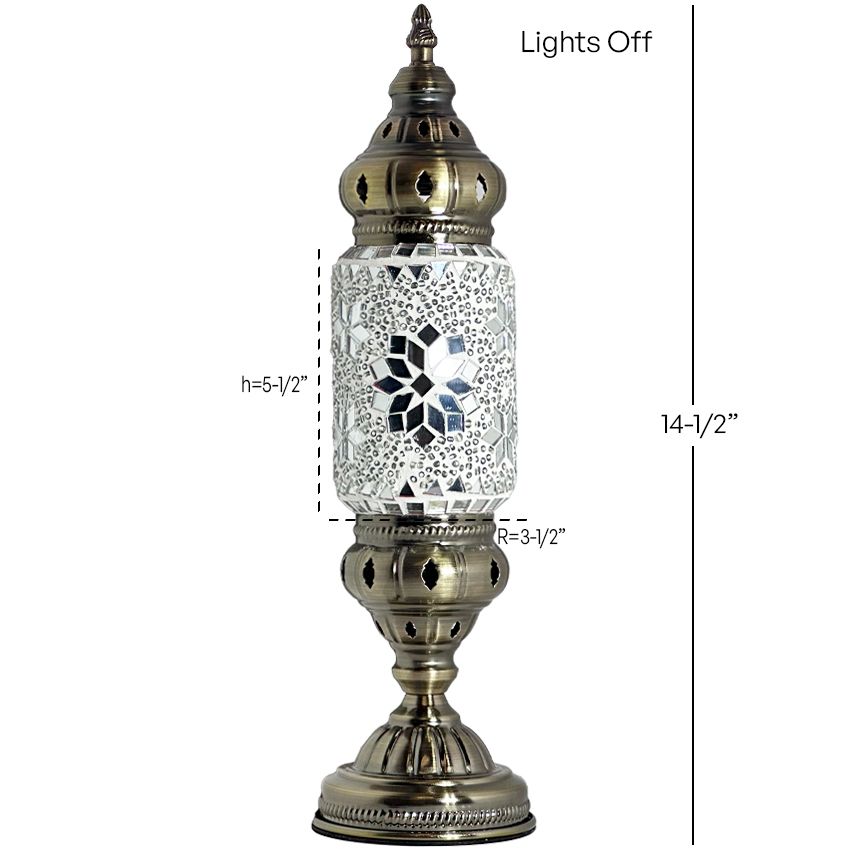 a tall metal lamp with a glass shade on top of it