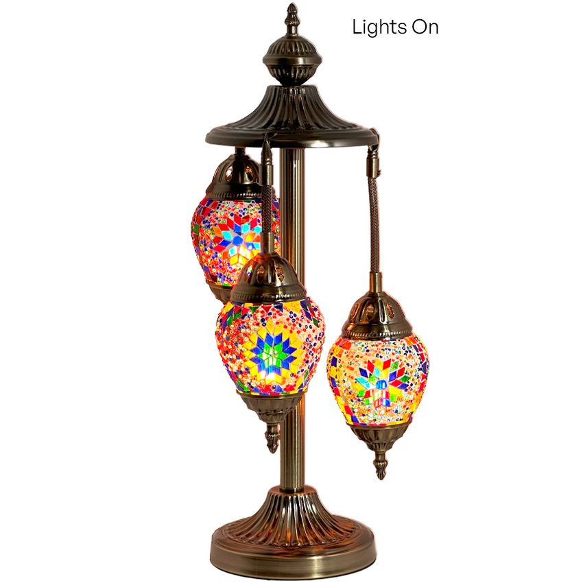 a lamp with three lights on top of it