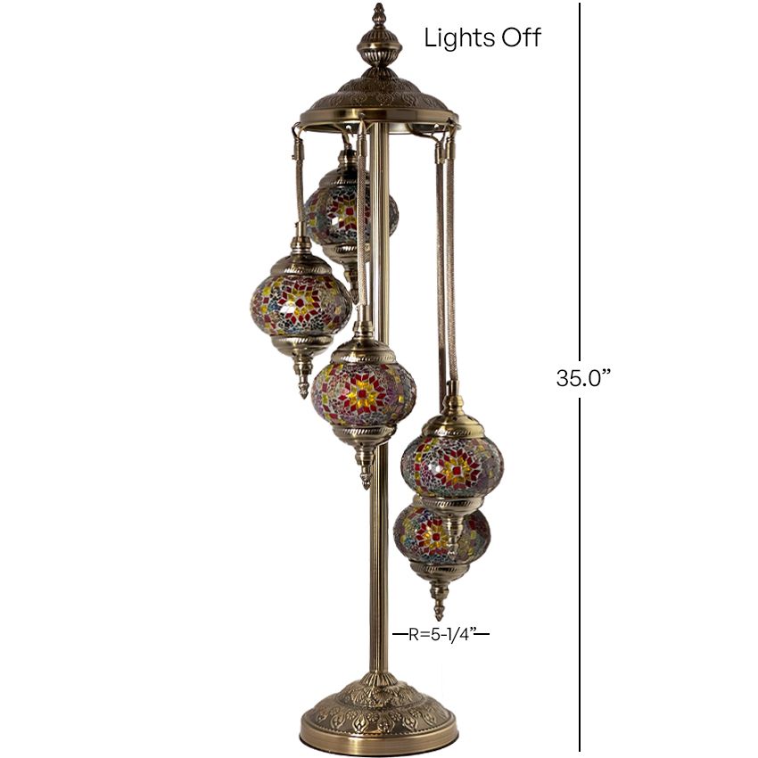 a tall metal pole with a bunch of glass balls on it