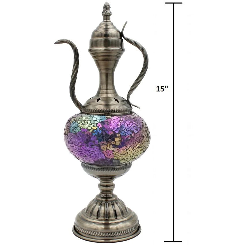 a silver vase with a colorful design on it