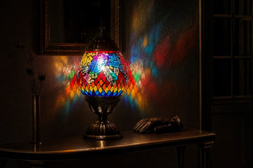 A mosaic glass lamp as a glowing focal point in an entryway