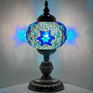 Blue handmade Turkish mosaic glass round table lamp glowing with hand-cut tessellated glass