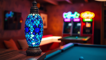 A colorful handmade Turkish-style mosaic glass lamp glowing beside a pool table in a home game room