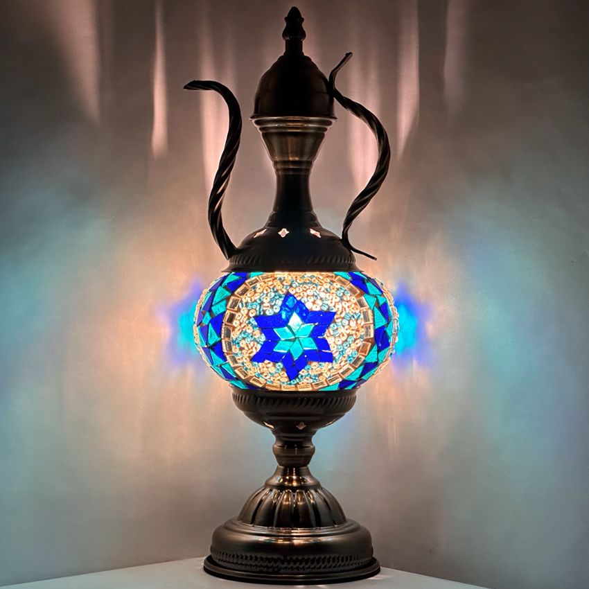 Turkish Blue Star Pitcher Lamp mosaic glass table lamp — glowing against a dark background