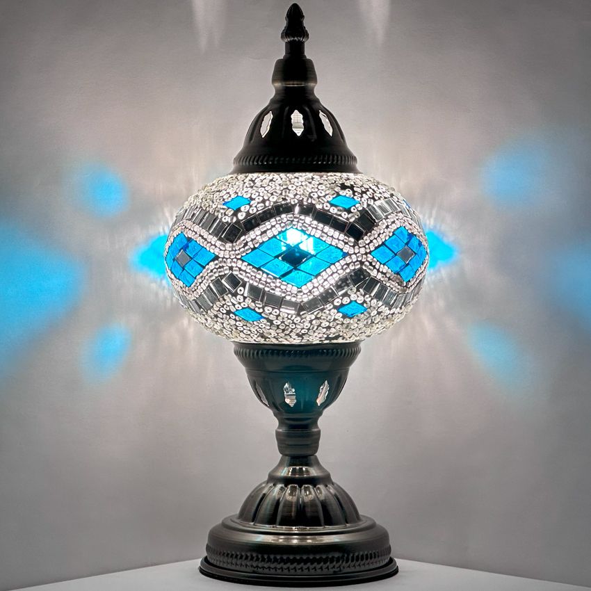 Icy Elegance mosaic glass table lamp — glowing against a dark background