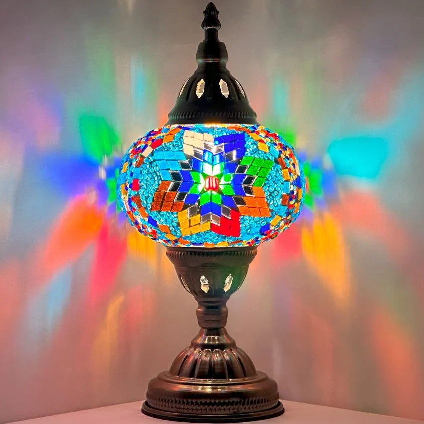 Coral Reef Inspired Bedside Mosaic Lamp with Colorful Glasse mosaic glass table lamp — glowing against a dark background