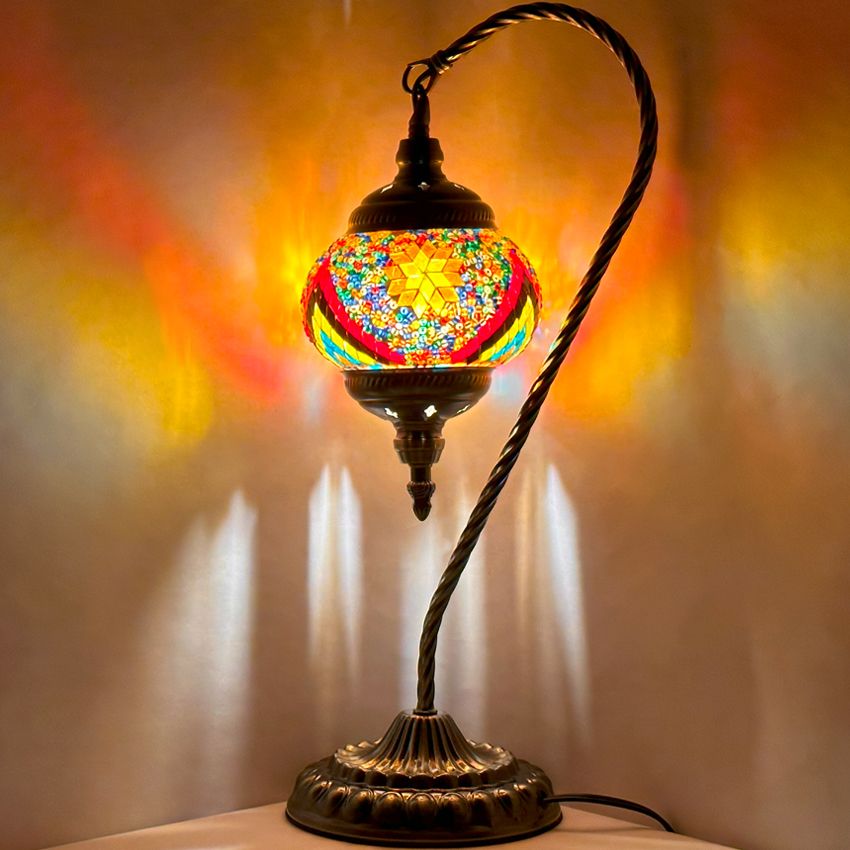 Fiery Waves Swan Neck Handcrafted Mosaic Turkish Lamp mosaic glass table lamp — glowing against a dark background