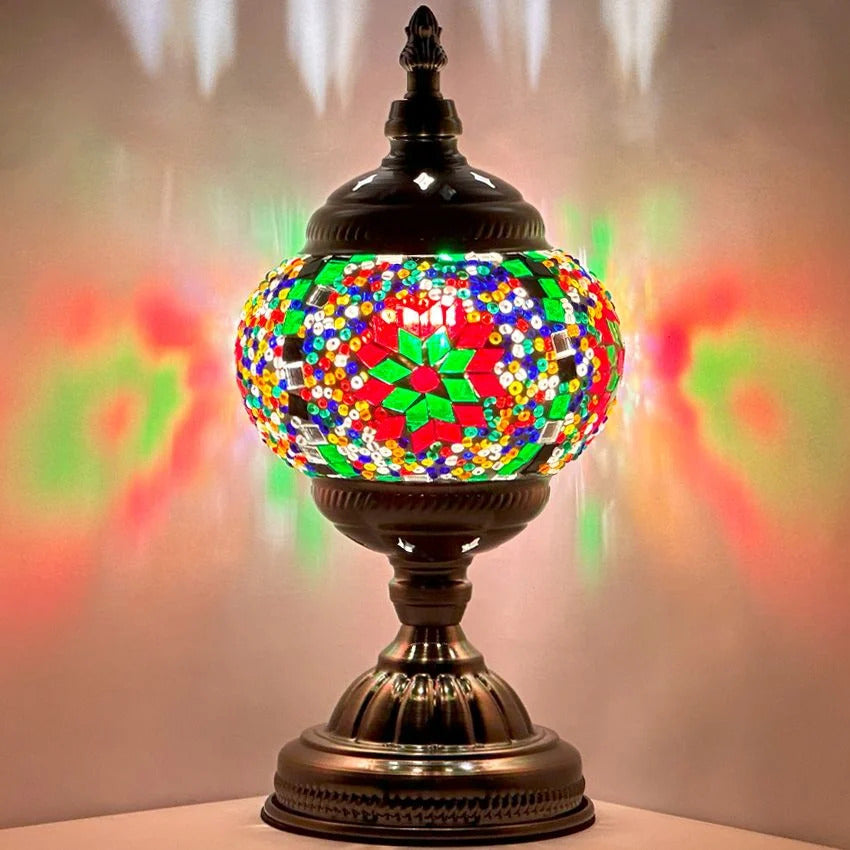 Rainbow Blaze mosaic glass table lamp — glowing against a dark background