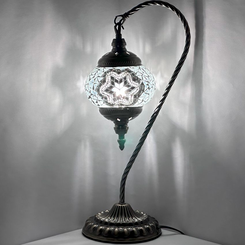 Moonlight Elegance mosaic glass table lamp — glowing against a dark background