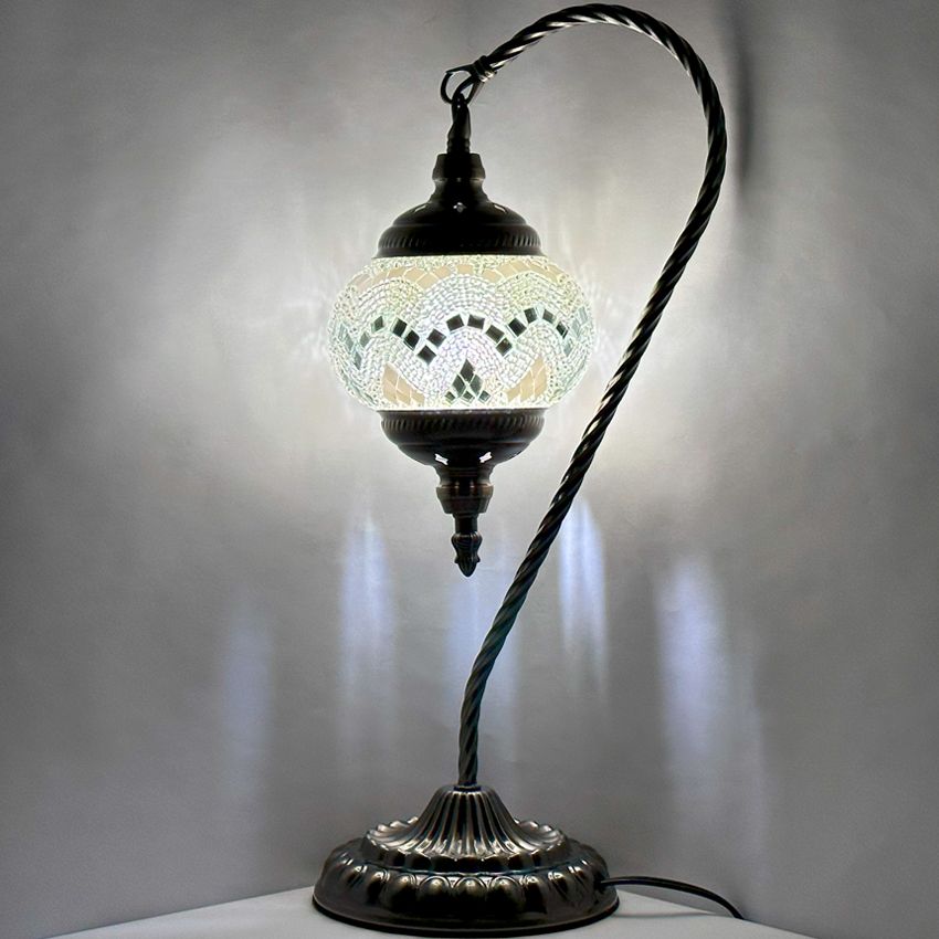 Soft Moonlight mosaic glass table lamp — glowing against a dark background