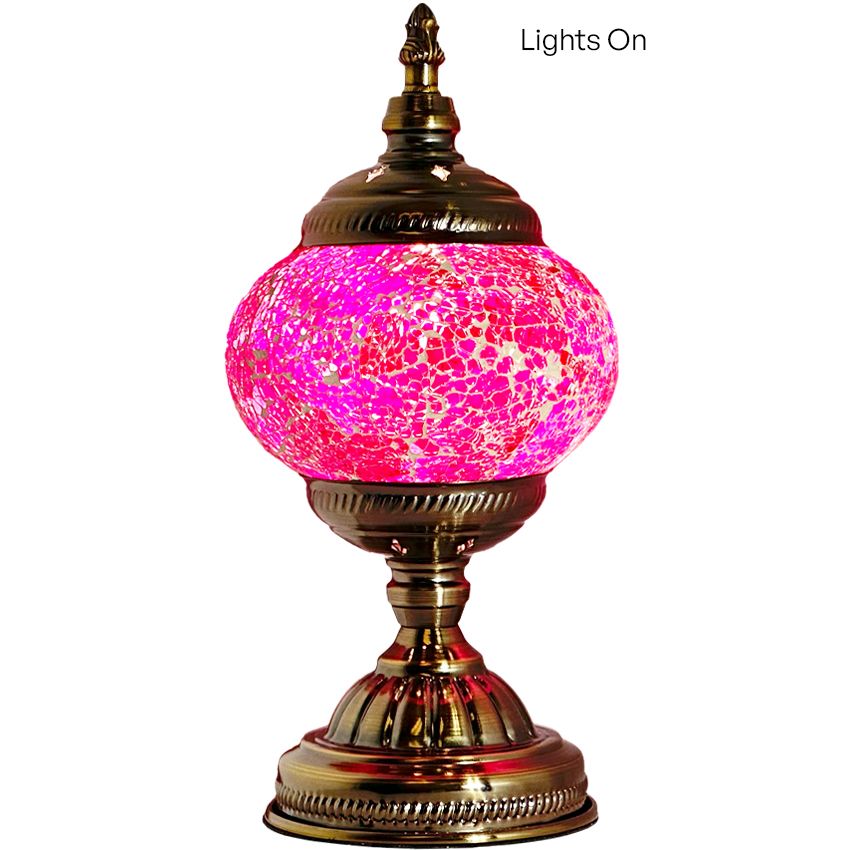 Amethyst Hues mosaic glass table lamp — glowing against a dark background