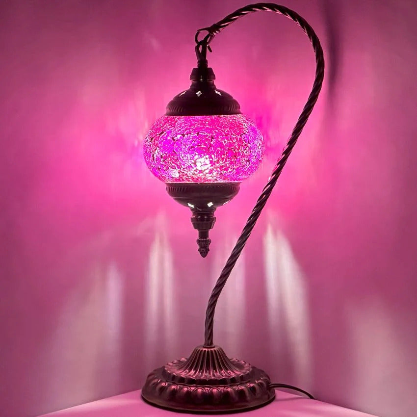 Elegant Lavender mosaic glass table lamp — glowing against a dark background