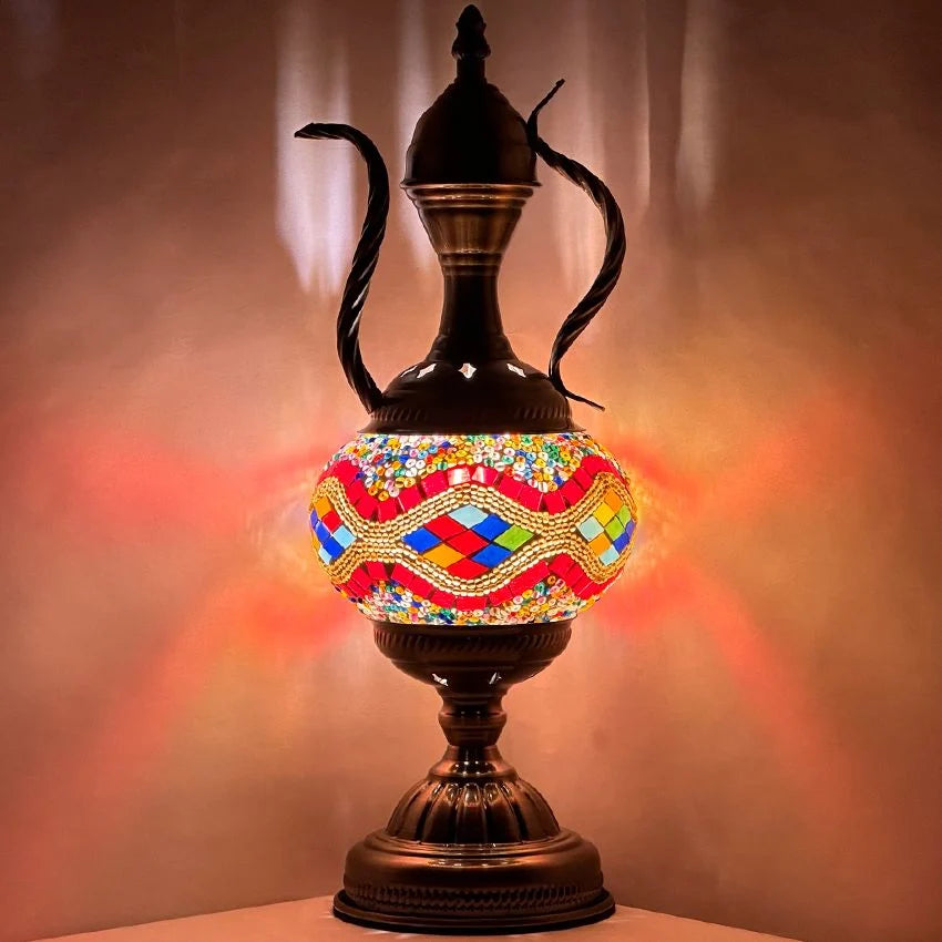 Rainbow Enchantment mosaic glass table lamp — glowing against a dark background