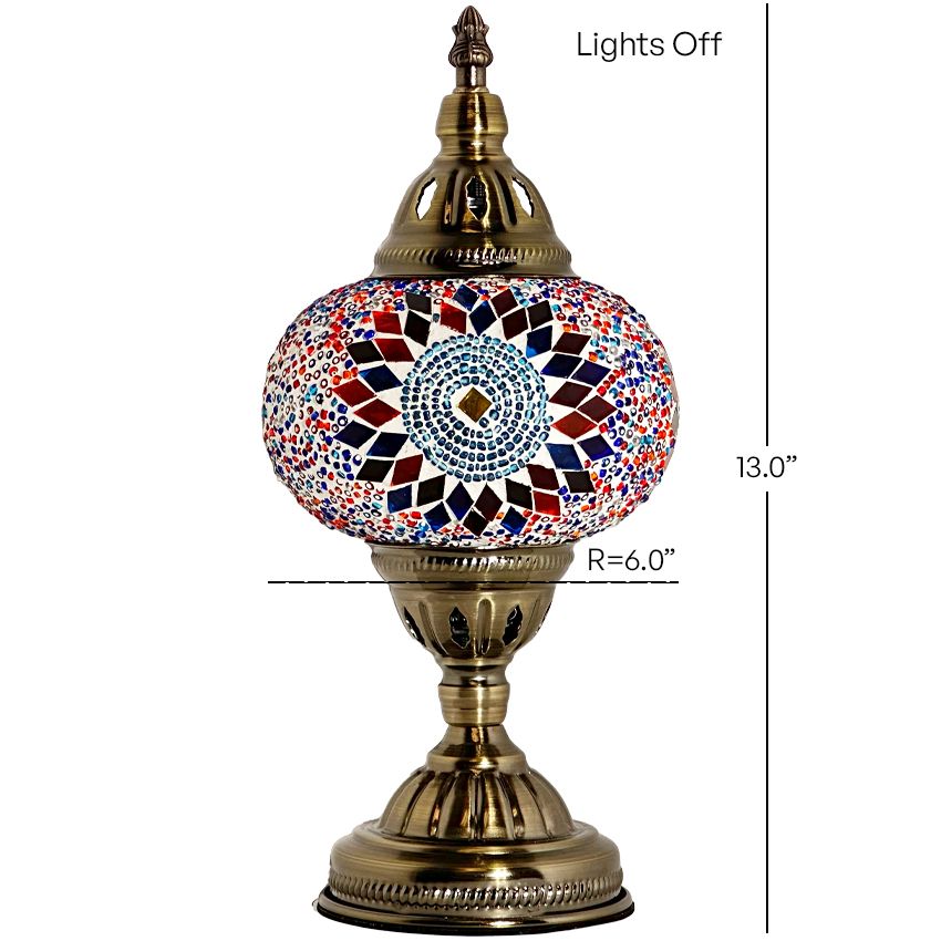 Sunflower Radiance mosaic glass table lamp — lit on a side table