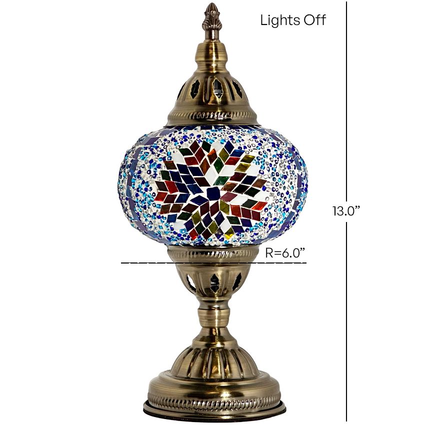Coral Bloom mosaic glass table lamp — lit on a side table