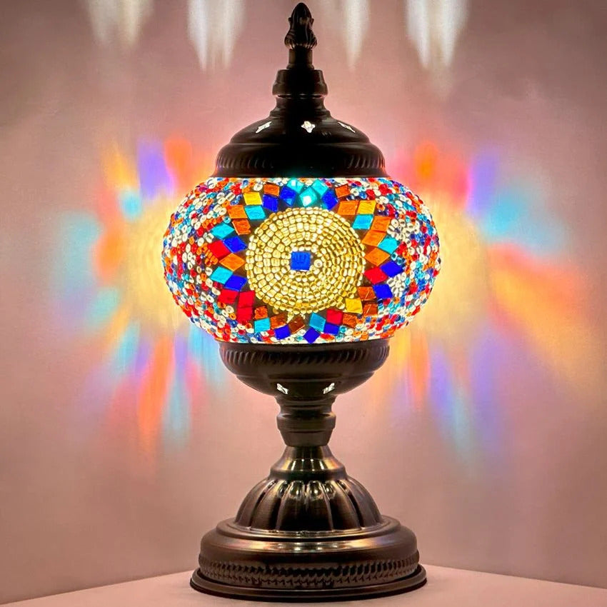 Prismatic Fantasy mosaic glass table lamp — glowing against a dark background