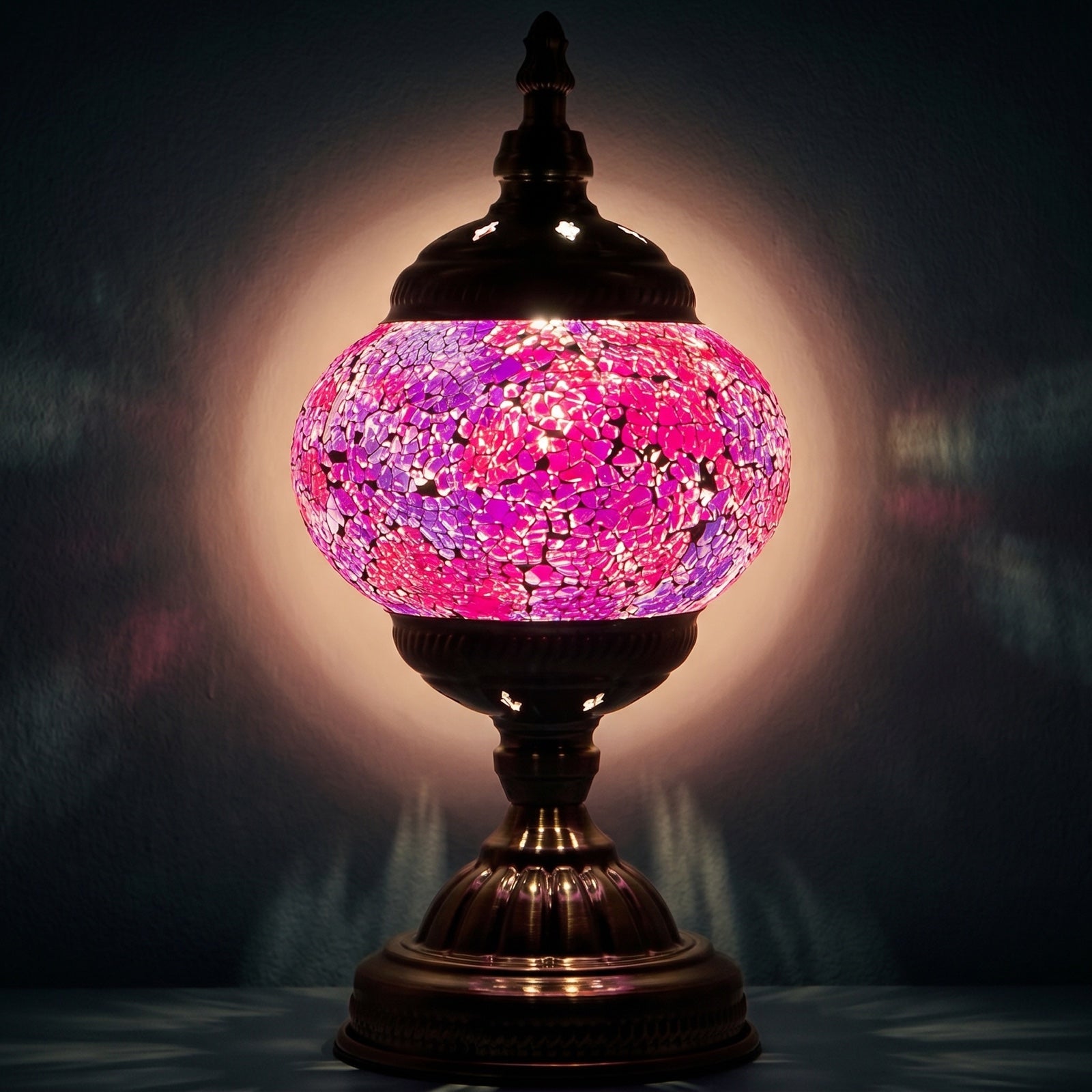 Amethyst Hues mosaic glass table lamp — glowing against a deep charcoal background