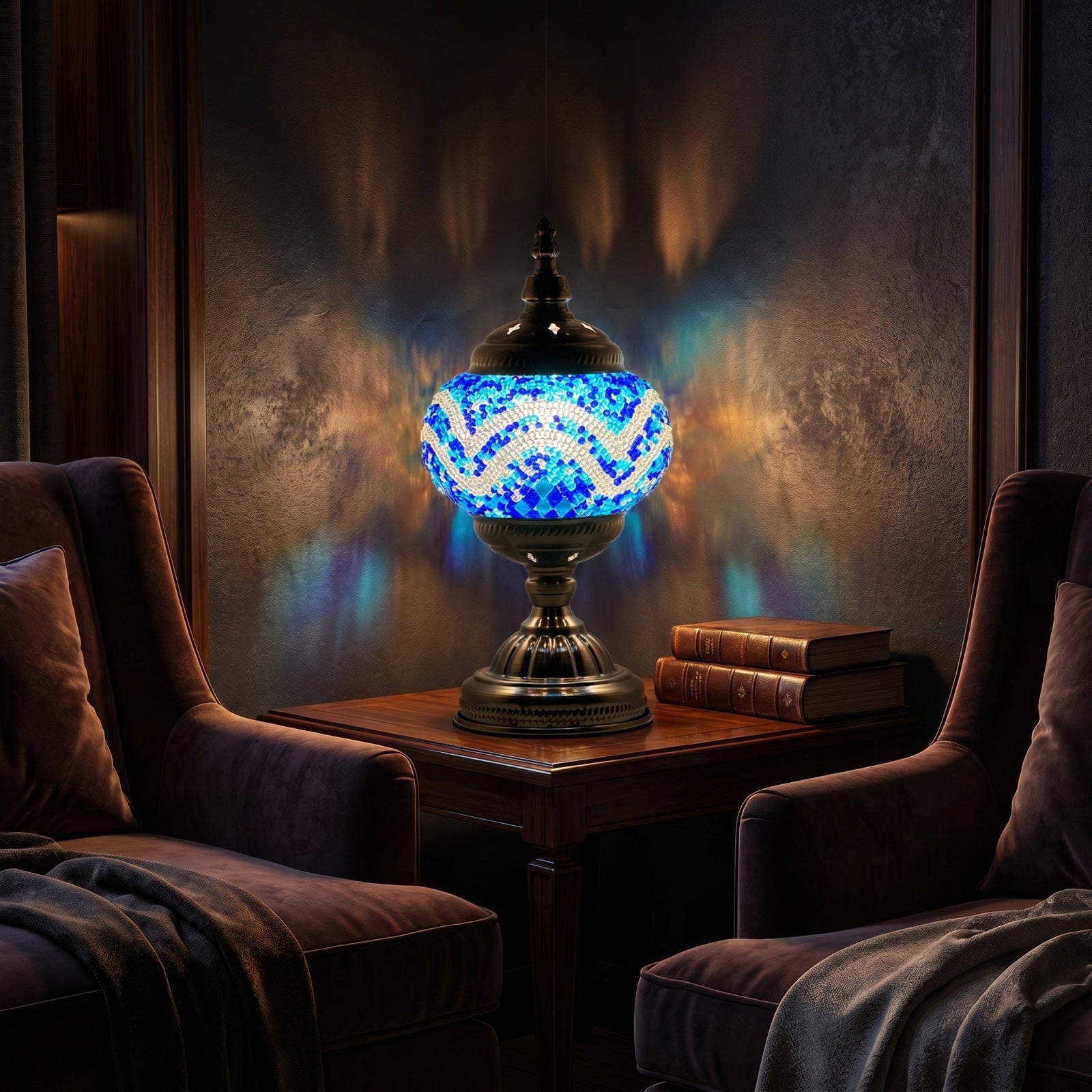 Blue mosaic glass table lamp casting warm patterned light in an evening living room