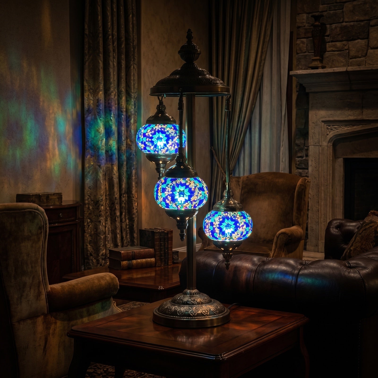 Blue Star Magic mosaic glass table lamp — glowing in a warm, dimly-lit evening room