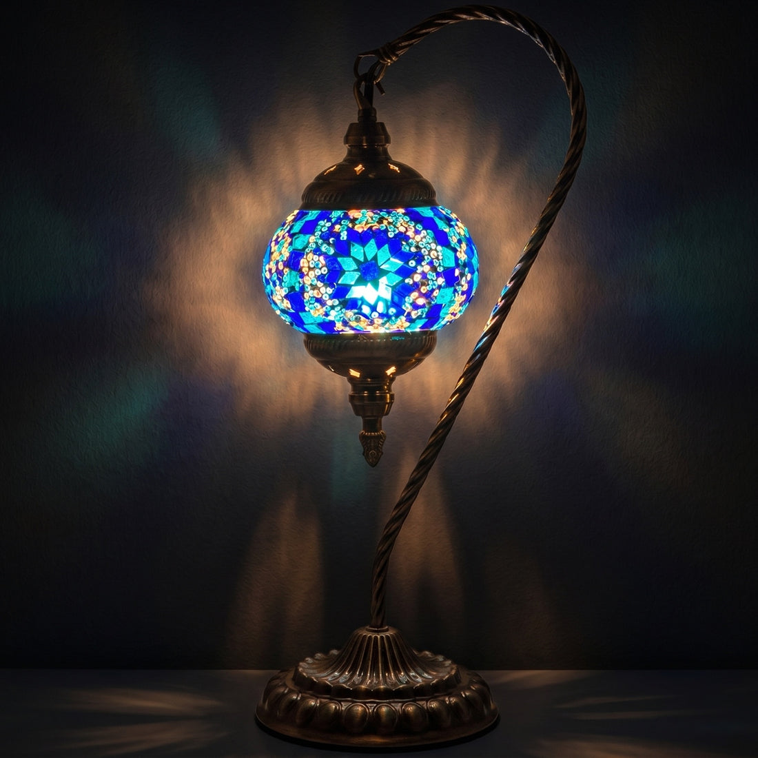 Blue Turkish Lamps with Swan Neck Design mosaic glass table lamp — glowing against a deep charcoal background