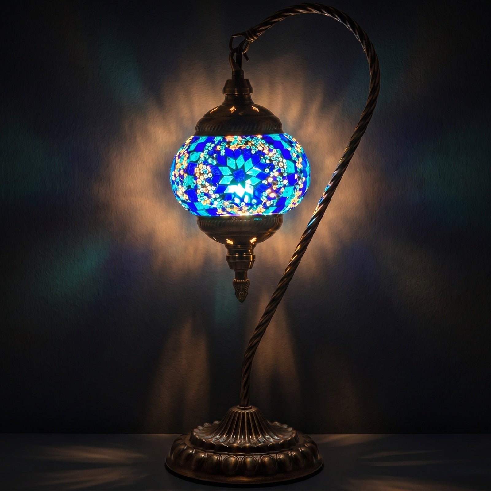 Blue Turkish Lamps with Swan Neck Design mosaic glass table lamp — glowing against a deep charcoal background