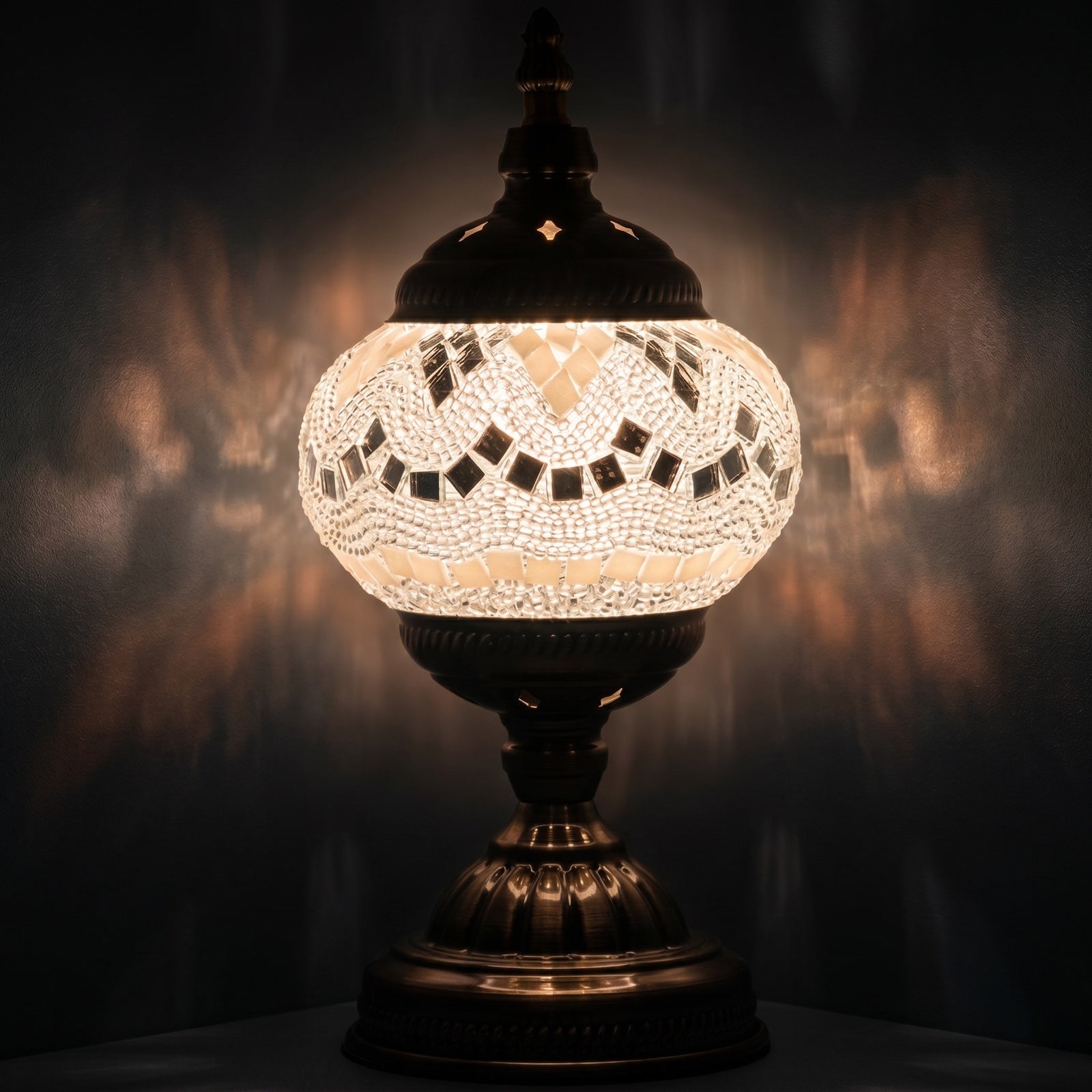 Bright Moonlight Colors mosaic glass table lamp — glowing against a deep charcoal background