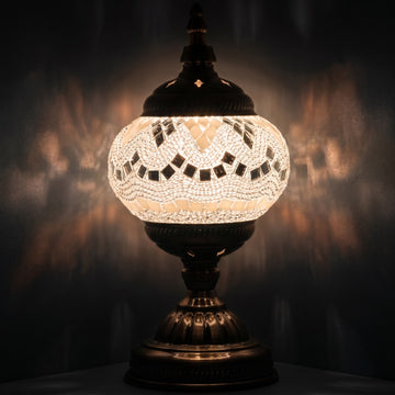 Bright Moonlight Colors mosaic glass table lamp — glowing against a deep charcoal background
