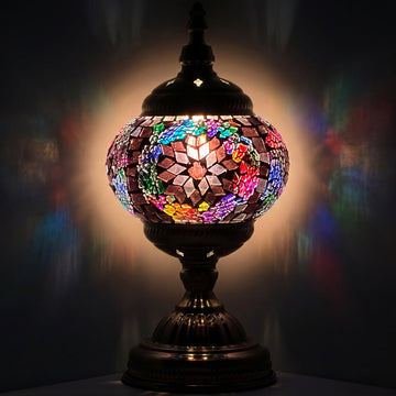 Brown Rainbow Mosaic Desk Lamps mosaic glass table lamp — glowing against a deep charcoal background