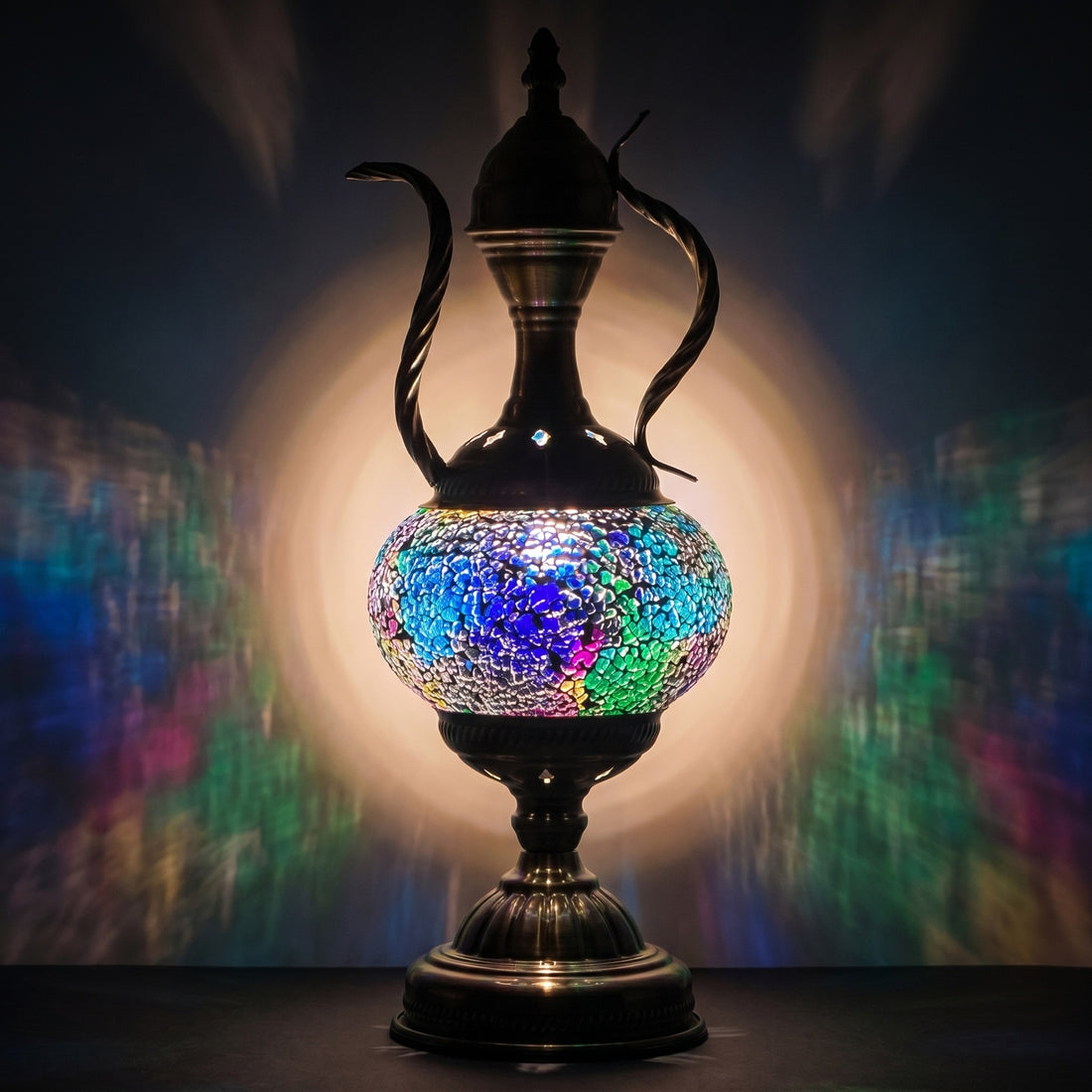 Celestial Beauty mosaic glass table lamp — glowing against a deep charcoal background