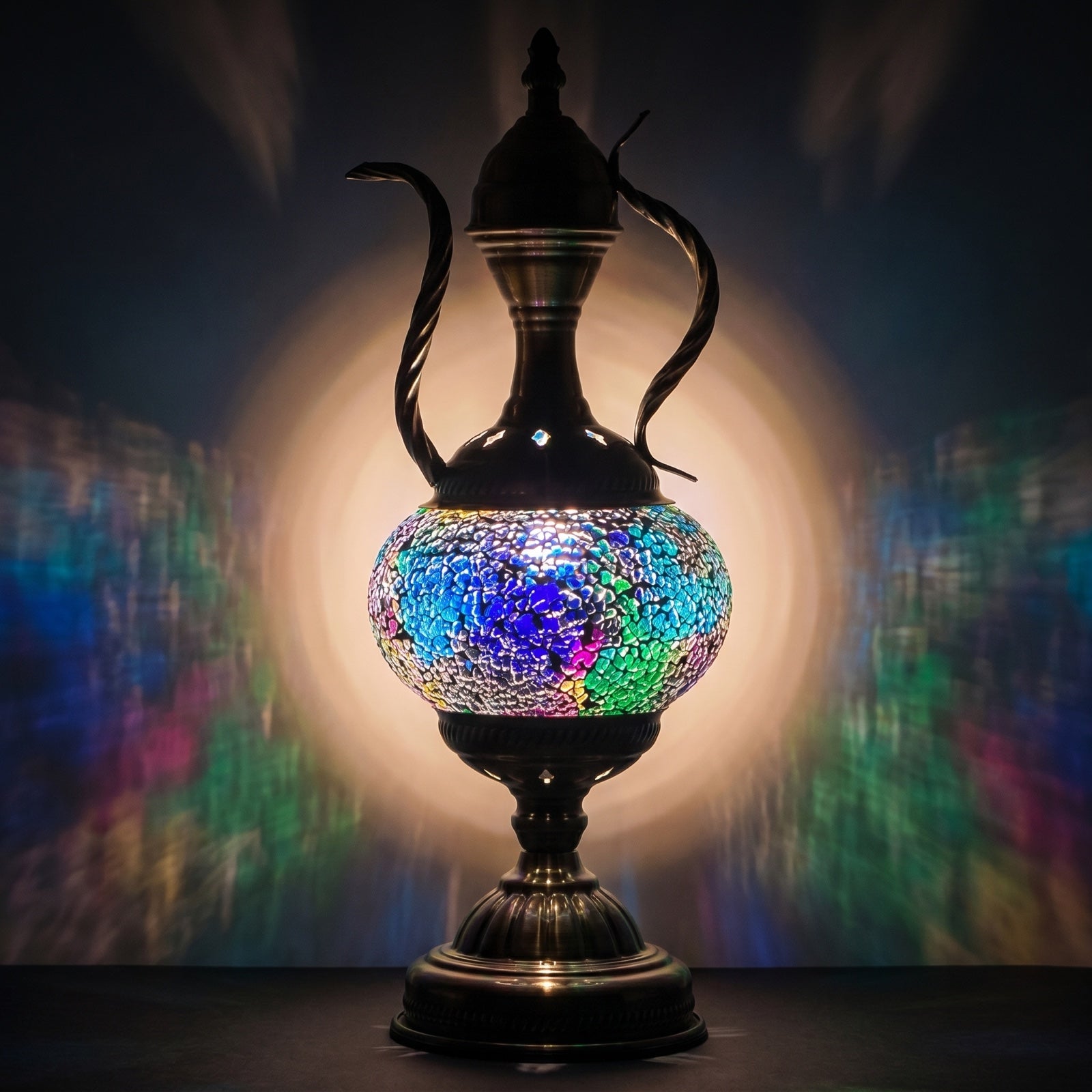 Celestial Beauty mosaic glass table lamp — glowing against a deep charcoal background
