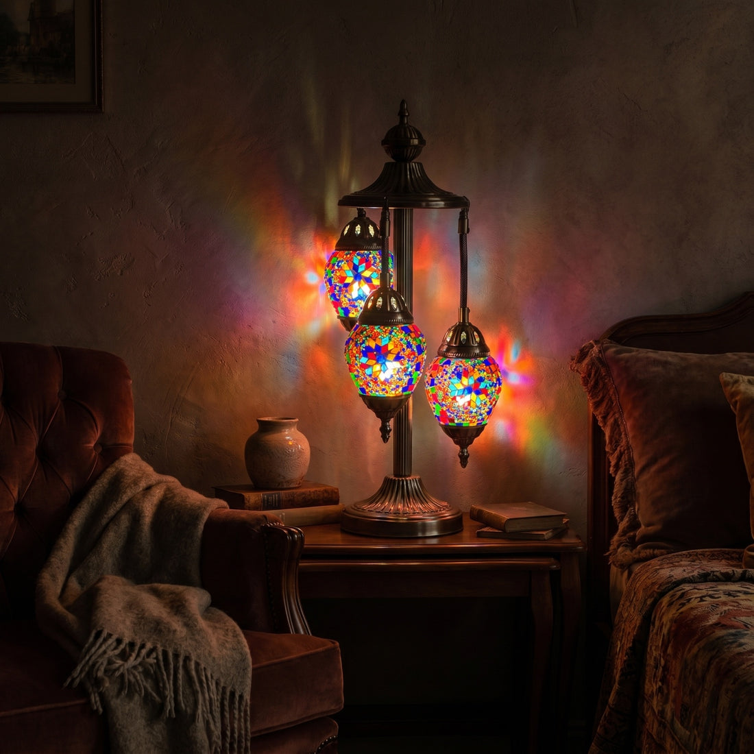 Colorful Trio mosaic glass table lamp — glowing against a deep charcoal background