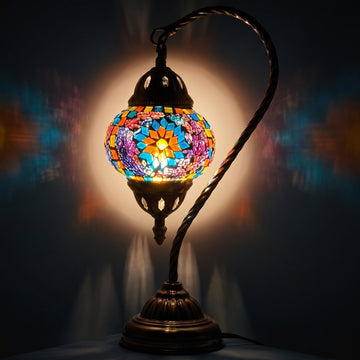 Elegant Blue Sunflower Mosaic Lamp with Turkish Swan Neck Design mosaic glass table lamp — glowing against a deep charcoal background