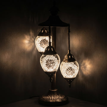 Elegant White Rose mosaic glass table lamp — glowing against a deep charcoal background