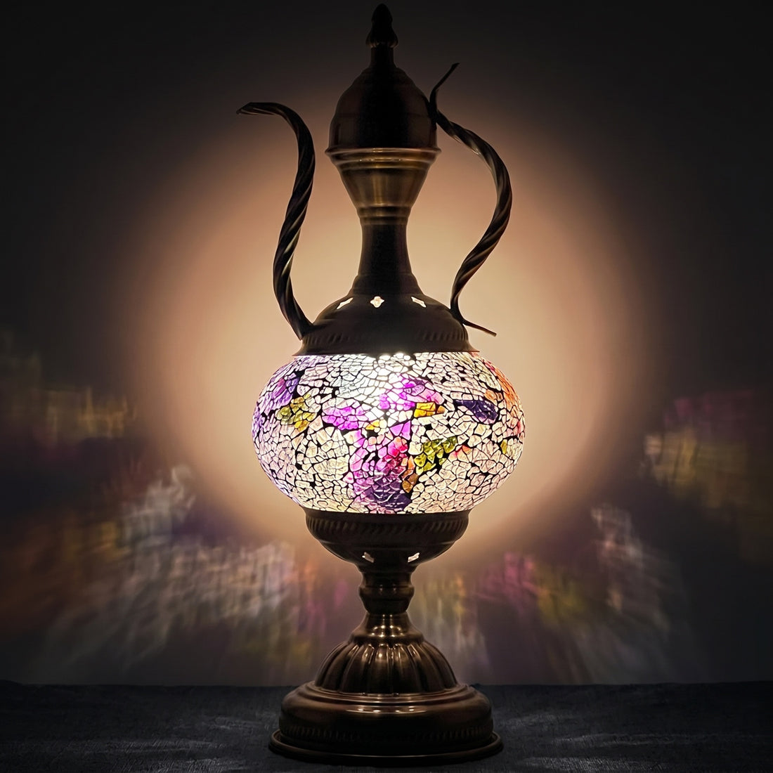 Enchanted Turkish Mosaic Lamp with Classic Pitcher Silhouette mosaic glass table lamp — glowing against a deep charcoal background