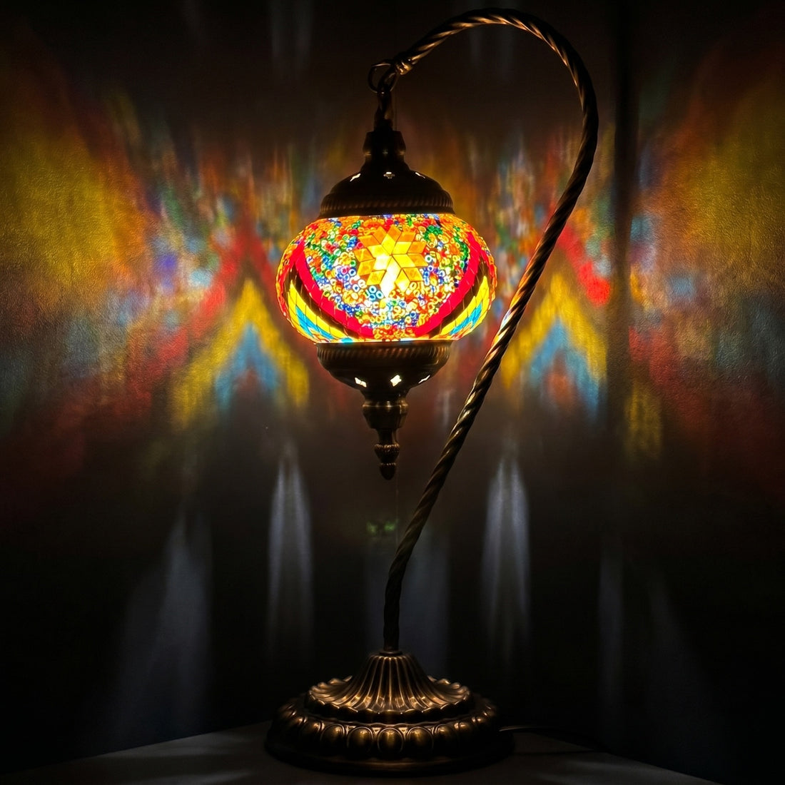 Fiery Waves Swan Neck Handcrafted Mosaic Turkish Lamp mosaic glass table lamp — glowing against a deep charcoal background