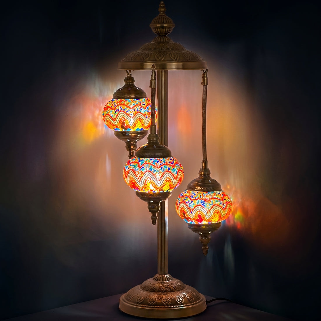 Fire Waves Handcrafted Turkish Floor Lamps with 3 Globes mosaic glass table lamp — glowing against a deep charcoal background