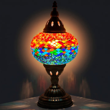 Fusion of Warm and Cool mosaic glass table lamp — glowing against a deep charcoal background