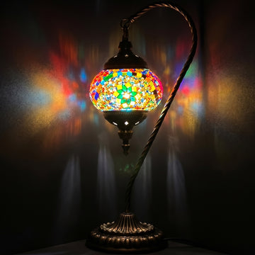 Goose Neck Mosaic Lamp with Colorful Flower Design mosaic glass table lamp — glowing against a deep charcoal background