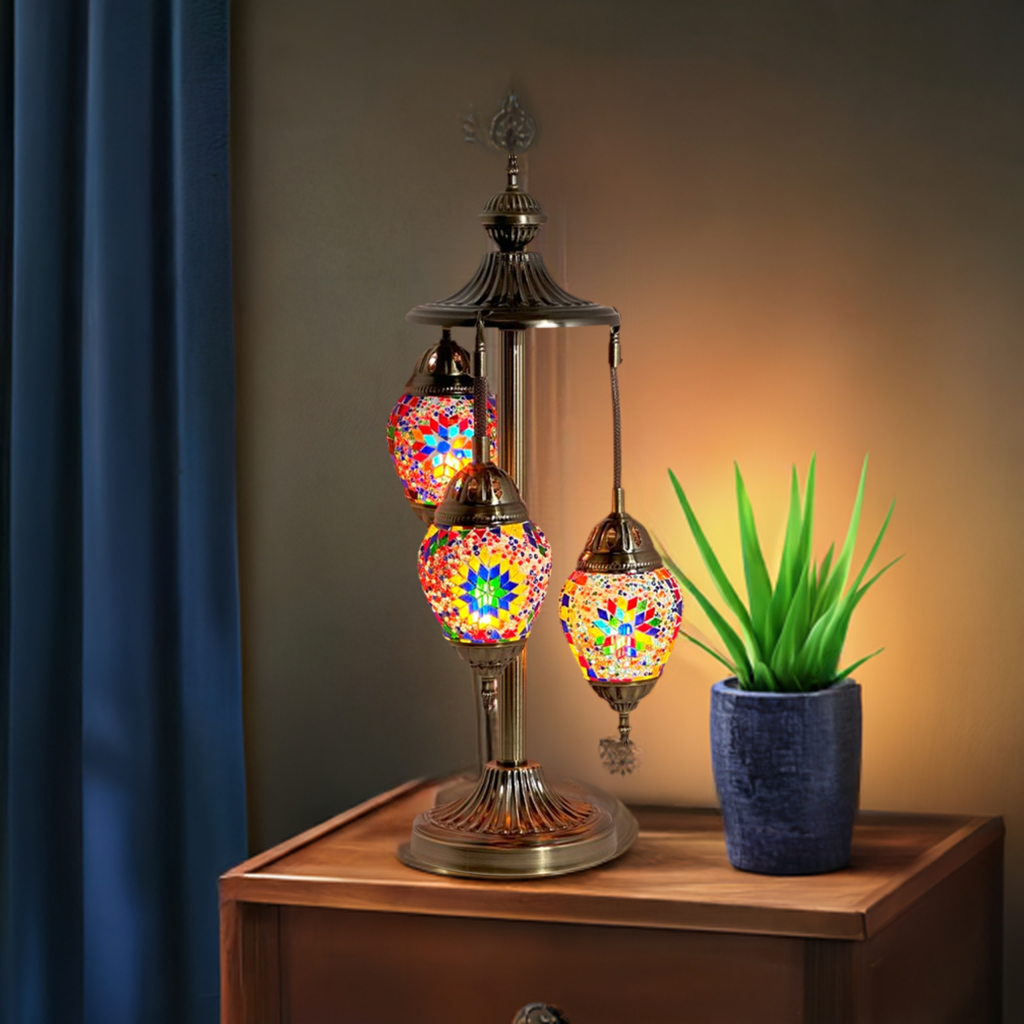 Garden Splendor mosaic glass table lamp — glowing in a styled room