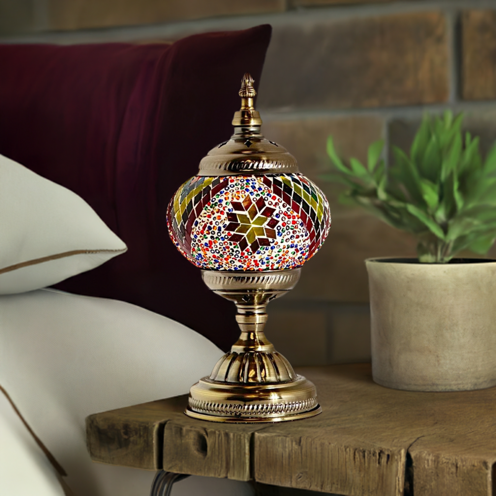 Floral Spectacle mosaic glass table lamp — on a nightstand